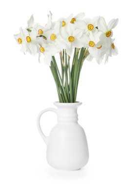 Beyaz vazodaki güzel nergisler.