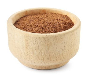 Beyaz kabın içindeki nutmeg tozu.