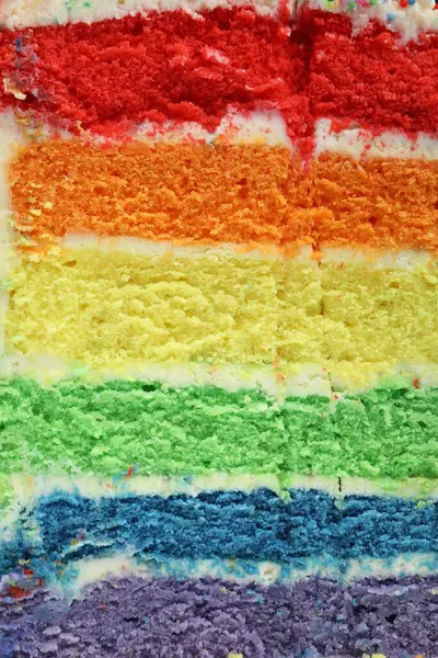 Arka plan olarak lezzetli bir gökkuşağı pastası, yakın plan.