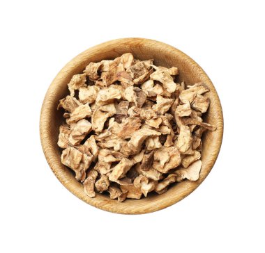 Kabın içindeki kuru hindiba kökleri beyaza izole edilmiş.