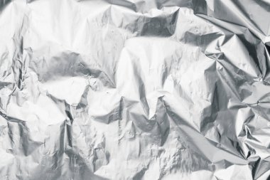 Arkaplan olarak buruşmuş alüminyum folyo, üst görünüm