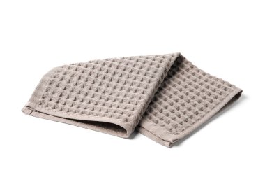 Temiz kahverengi waffle havlusu beyaza izole edilmiş.