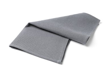 Temiz gri waffle havlusu beyaza izole edilmiş.