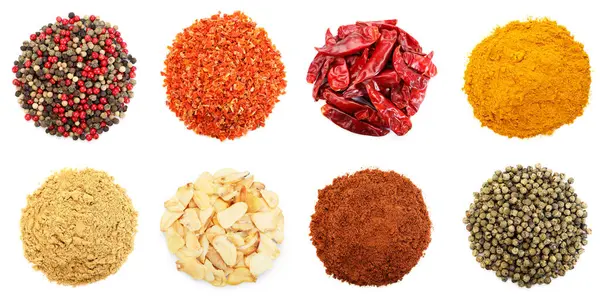 Beyaz arka planda farklı aromatik baharatlar, set. Üst görünüm