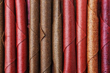 Arka plan olarak lezzetli meyve ruloları, üst manzara