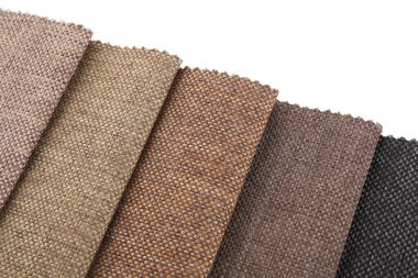 Beyaz üzerinde izole edilmiş farklı kumaş örnekleri