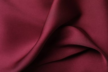 Buruşuk bordo ipek kumaş arka plan olarak, üst görünüm