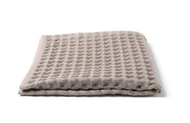 Temiz kahverengi waffle havlusu beyaza izole edilmiş.