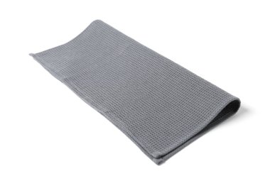 Temiz gri waffle havlusu beyaza izole edilmiş.