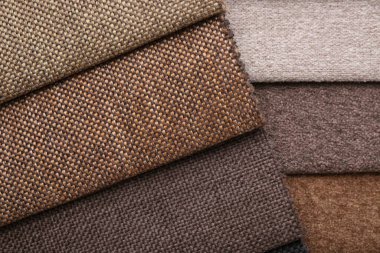 Arka plan olarak farklı kumaş örnekleri, üst görünüm