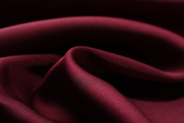 Buruşuk bordo ipek kumaş arka plan olarak, yakın plan