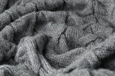 Arkaplan olarak gri yün kumaş dokusu, yakın plan