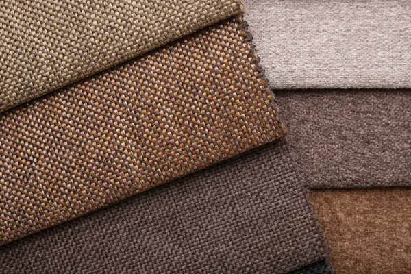 Arka plan olarak farklı kumaş örnekleri, üst görünüm