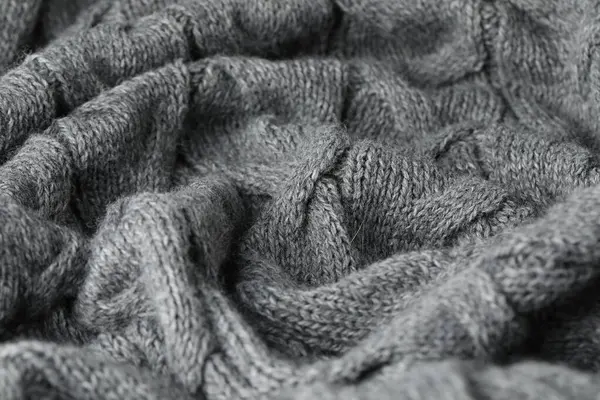 Arkaplan olarak gri yün kumaş dokusu, yakın plan
