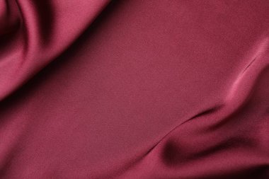 Buruşuk bordo ipek kumaş arka plan olarak, üst görünüm