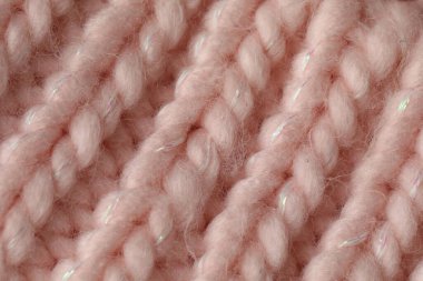 Arka plan olarak pembe yün kumaş dokusu, üst görünüm