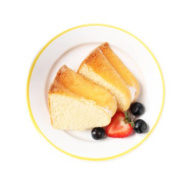 Lezzetli kek parçaları, beyaz böğürtlenli, üst manzara.