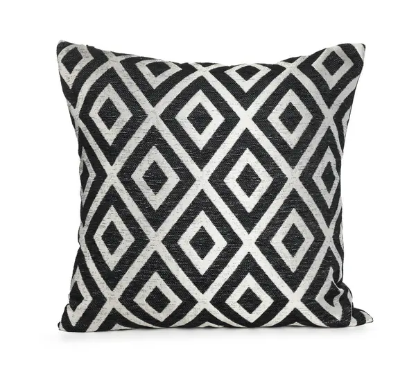 Beyaz desenli şık bir yastık.