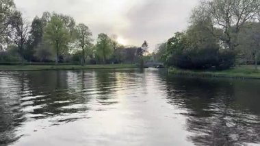 Beautiful city canal and green trees in spring