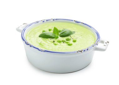 Lezzetli bezelye kremalı çorba ve fesleğen.
