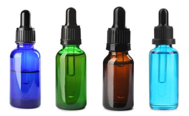 Farklı şişelerdeki tentürler beyaza izole edilmiş.