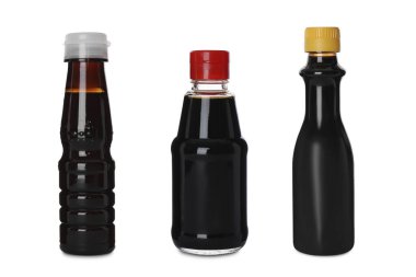 Soy sauce in bottles isolated on white, set
