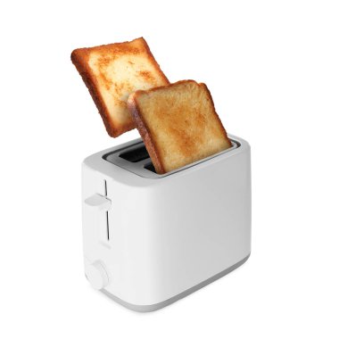 Beyaz arka planda tost makinesinden fırlayan kızarmış ekmek dilimleri