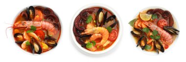 Beyaz kolajla izole edilmiş kâselerdeki lezzetli deniz ürünleri çorbası. Üst görünüm