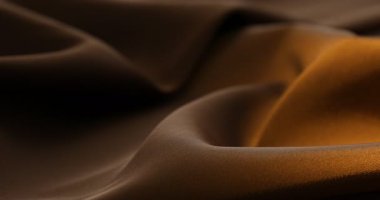 Arkaplan olarak buruşuk kahverengi ipek kumaş, yakın plan