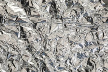 Arkaplan olarak buruşmuş alüminyum folyo, üst görünüm