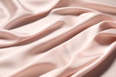 Pembe buruşuk ipek kumaş arka plan olarak, yakın plan