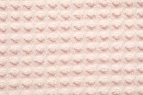 Arka plan olarak temiz bej waffle havlusu, üst görünüm