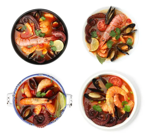 Beyaz kolajla izole edilmiş kâselerdeki lezzetli deniz ürünleri çorbası. Üst görünüm