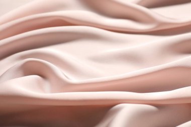Pembe buruşuk ipek kumaş arka plan olarak, yakın plan