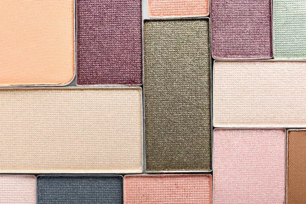 Güzel göz farı dolum kapları arka plan olarak, üst görünüm