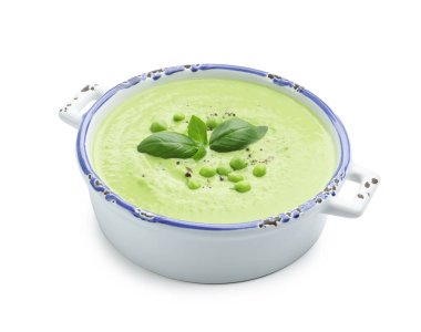 Lezzetli bezelye kremalı çorba ve fesleğen.