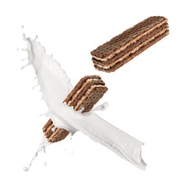 Lezzetli çıtır gofretler ve beyaz arka planda süt sıçraması.