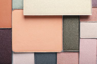 Güzel göz farı dolum kapları arka plan olarak, üst görünüm