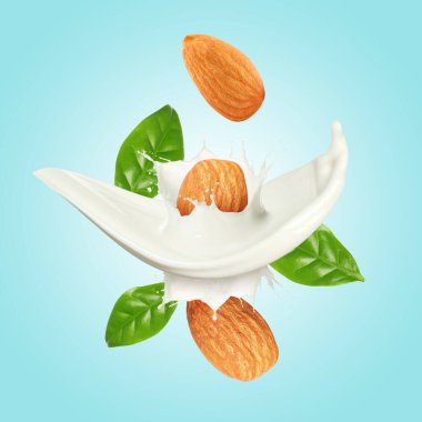 Açık mavi arka planda fındık sütü, badem ve yeşil yapraklar.