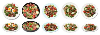 Beyaz arka planda lezzetli taze salatalar, kolaj. Üst ve yan görünüm