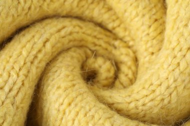 Arkaplan olarak sarı yün kumaş dokusu, yakın plan