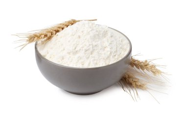 Buğday unu ve çiviler beyaza izole edilmiş.