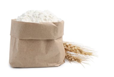 Buğday unu ve çiviler beyaza izole edilmiş.