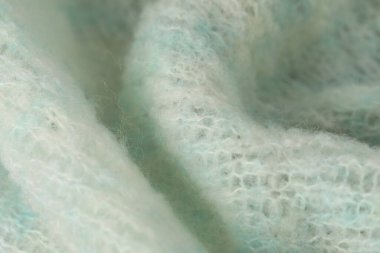 Arka plan olarak turkuaz yün kumaş dokusu, yakın plan