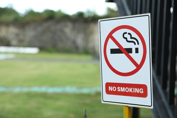 No Smoking sign outdoors, space for text
