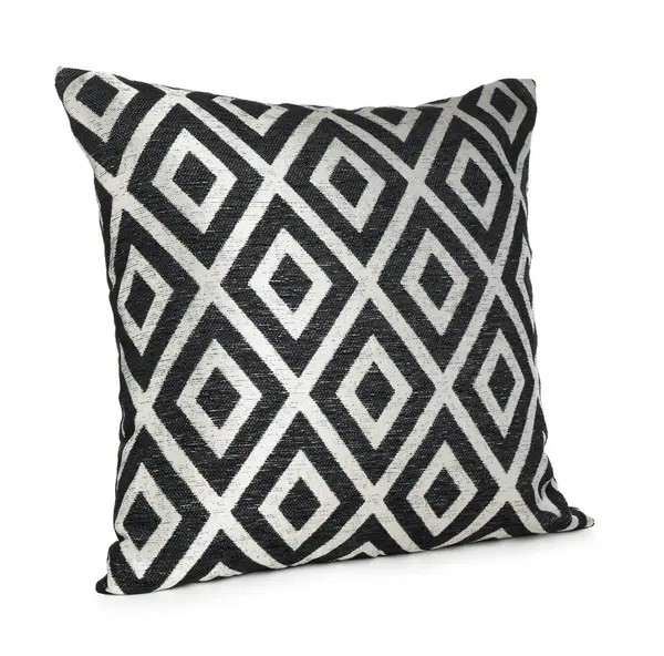 Beyaz desenli şık bir yastık.