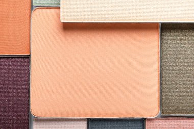 Güzel göz farı dolum kapları arka plan olarak, üst görünüm