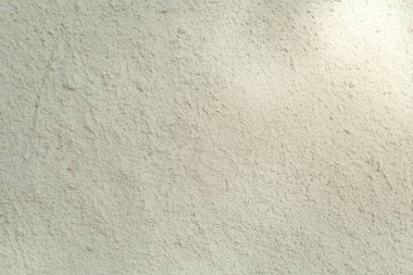 Arka plan olarak beyaz çimento desenli yüzey, yakın plan