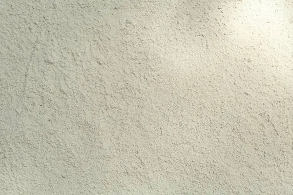 Arka plan olarak beyaz çimento desenli yüzey, yakın plan