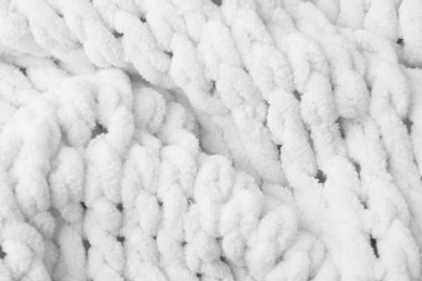 Arka plan olarak beyaz örülmüş kumaşın dokusu, üst görünüm